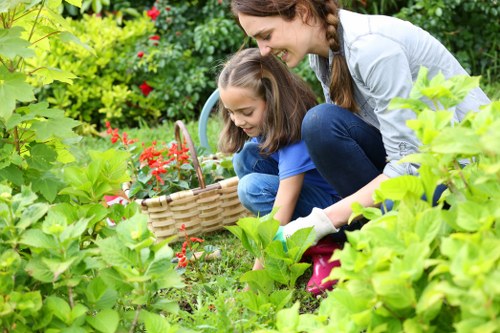 Seasonal garden maintenance activities being performed in Ruislip